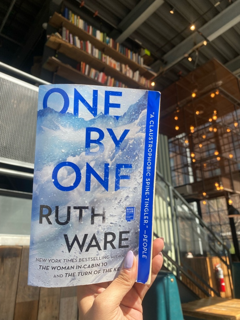 One by One by Ruth Ware - Blue Paperback Novel